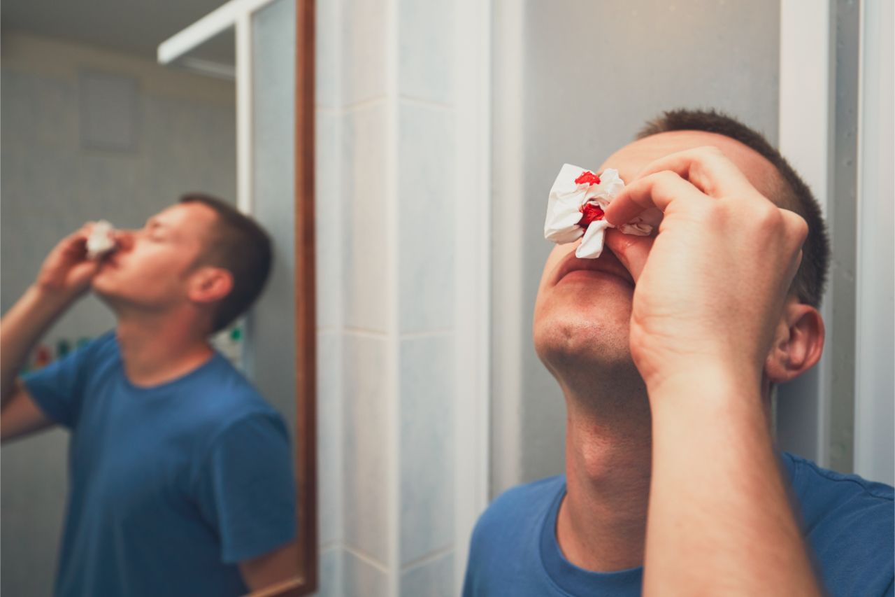 Man with bleeding nose
